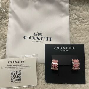 Coach Women's Earrings in Pink and silver small signature hoop.